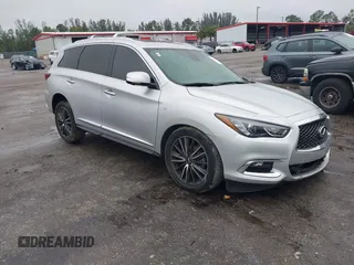 2019 Infiniti QX60 Pure z VIN 5N1DL0MM9KC534133, wystawiony jako IAAI lot #41407744 z przebiegiem 215 402 mil mil oraz . Historia ofert i sprzedaży dostępna na DreamBid. Obrazek 1.