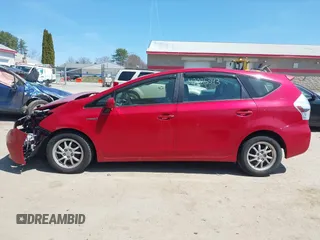 2012 Toyota Prius Two z VIN JTDZN3EU2C3071001, wystawiony jako IAAI lot #42085343 z przebiegiem Nie podano mil oraz . Historia ofert i sprzedaży dostępna na DreamBid. Obrazek 13.