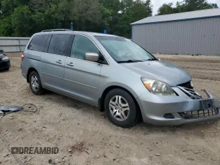 2007 Honda Odyssey EX-L z VIN 5FNRL38657B011922, wystawiony jako Copart lot #56147975 z przebiegiem 149 451 mil mil oraz Szkoda całkowita • Salvage title. Historia ofert i sprzedaży dostępna na DreamBid. Obrazek 4.
