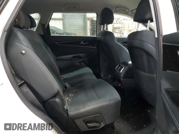 2019 Kia Sorento LX z VIN 5XYPG4A56KG558427, wystawiony jako Copart lot #51971055 z przebiegiem 103 523 mil mil oraz Szkoda całkowita • Salvage title. Historia ofert i sprzedaży dostępna na DreamBid. Obrazek 11.