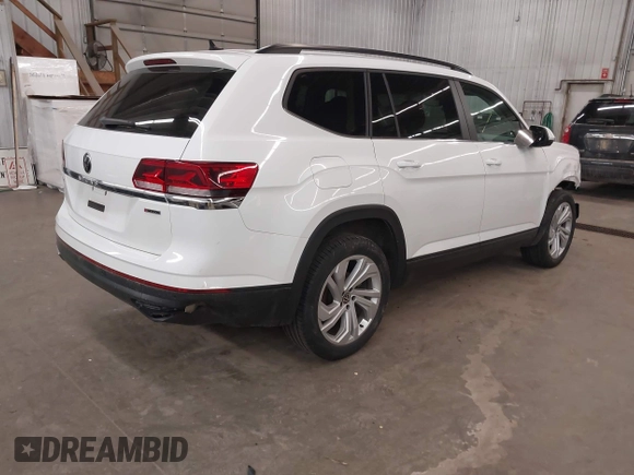 2021 Volkswagen Atlas SE z VIN 1V2HR2CA3MC539997, wystawiony jako IAAI lot #41977786 z przebiegiem 77 372 mil mil oraz . Historia ofert i sprzedaży dostępna na DreamBid. Obrazek 4.