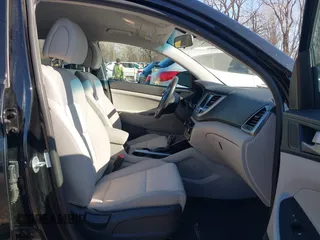 2018 Hyundai Tucson Sport with VIN KM8J33ALXJU771481, listed as a IAAI auction lot 41399335 with 64,905 mi miles. Bid and sale history available at carsss.com. Image 5.