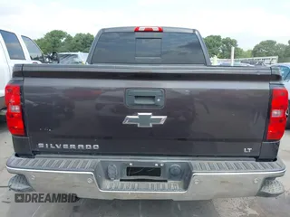 2015 Chevrolet Silverado 1500 LT with VIN 3GCPCREC7FG411610, listed as a IAAI auction lot 41975360 with 243,335 mi miles and . Bid and sale history available at DreamBid. Image 16.