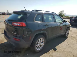 2015 Jeep Cherokee Sport with VIN 1C4PJMAB7FW773265, listed as a Copart auction lot 61134045 with 117,628 mi miles and Salvage title. Bid and sale history available at DreamBid. Image 3.