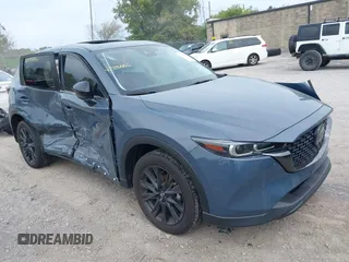 2023 Mazda CX-5 2.5 S Carbon Edition with VIN JM3KFBCMXP0231393, listed as a IAAI auction lot 40384486 with 13,117 mi miles. Bid and sale history available at carsss.com. Image 1.