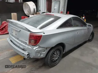 2004 Toyota Celica GT z VIN JTDDR32TX40167973, wystawiony jako IAAI lot #41458284 z przebiegiem 203 384 mil mil oraz . Historia ofert i sprzedaży dostępna na DreamBid. Obrazek 4.