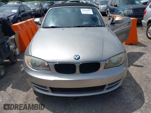 2011 BMW 1 Series 128i with VIN WBAUL7C5XBVE87044, listed as a IAAI auction lot 42095602 with 163,049 mi miles and . Bid and sale history available at carsss.com. Image 6.