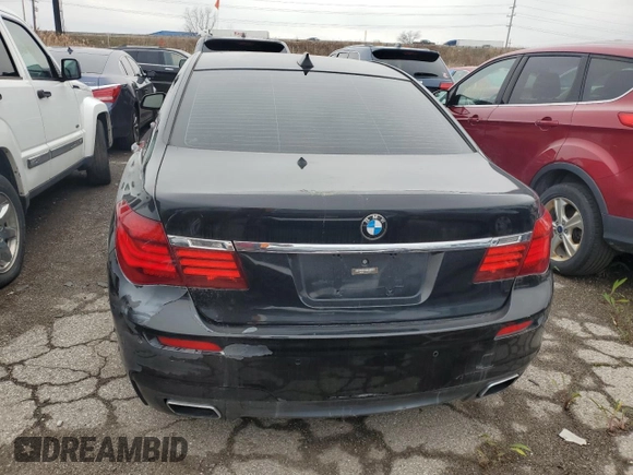 2013 BMW 7 Series 750i xDrive с VIN WBAYB6C55DD223914, выставлен на аукционе Copart как лот 81825144 с пробегом 81 818 миль миль и Списание • Salvage title. История ставок и продаж доступна на DreamBid. Изображение 6.