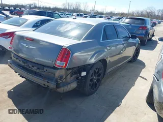 2012 Chrysler 300 S with VIN 2C3CCABG2CH155173, listed as a IAAI auction lot 41941875 with 191,313 mi miles and . Bid and sale history available at DreamBid. Image 4.