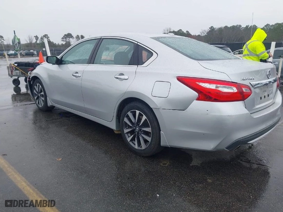 2016 Nissan Altima 2.5 SR with VIN 1N4AL3AP3GC129874, listed as a IAAI auction lot 41582912 with 106,536 mi miles. Bid and sale history available at carsss.com. Image 3.