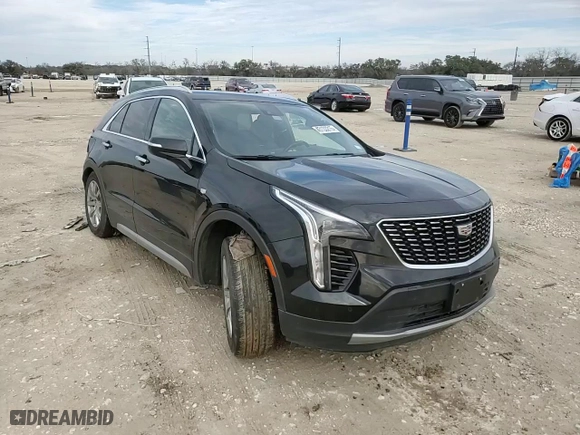 2022 Cadillac XT4 FWD Premium Luxury with VIN 1GYFZCR42NF135325, listed as a Copart auction lot 43133215 with 48,998 mi miles and Salvage Title. Bid and sale history available at carsss.com. Image 12.