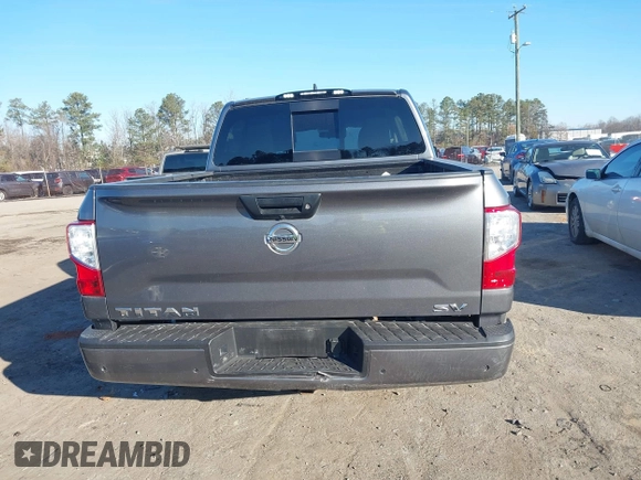 2022 Nissan Titan SV with VIN 1N6AA1EE3NN104176, listed as a IAAI auction lot 41159789 with 53,991 mi miles and . Bid and sale history available at DreamBid. Image 16.