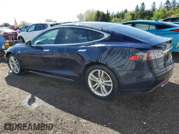 2014 Tesla Model S 60 z VIN 5YJSA1H10EFP35319, wystawiony jako Copart lot #53868745 z przebiegiem 209 424 mil mil oraz Szkoda całkowita • Salvage title. Historia ofert i sprzedaży dostępna na DreamBid. Obrazek 2.