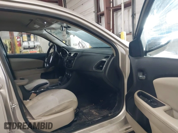2014 Chrysler 200 Touring with VIN 1C3CCBBB8EN107990, listed as a IAAI auction lot 41878376 with 137,424 mi miles. Bid and sale history available at carsss.com. Image 5.