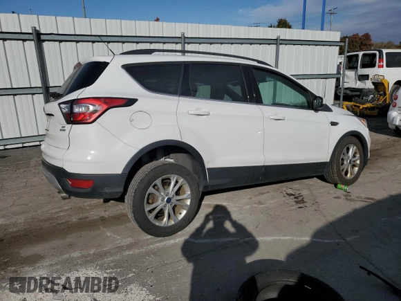 2018 Ford Escape SE with VIN 1FMCU0G96JUC41704, listed as a Copart auction lot 77678304 with 0 mi miles and Salvage Title. Bid and sale history available at carsss.com. Image 3.