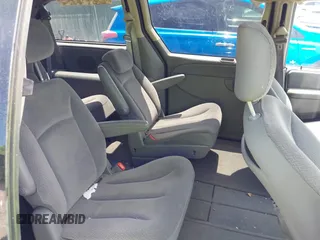 2005 Dodge Caravan SXT z VIN 2D4GP44L35R498670, wystawiony jako IAAI lot #42278939 z przebiegiem Nie podano mil oraz . Historia ofert i sprzedaży dostępna na DreamBid. Obrazek 8.