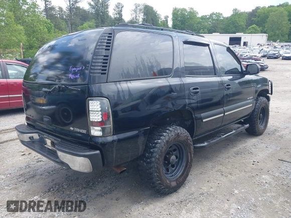 2002 Chevrolet Tahoe LS with VIN 1GNEC13V12J329045, listed as a IAAI auction lot 42099926 with 266,291 mi miles and . Bid and sale history available at DreamBid. Image 4.