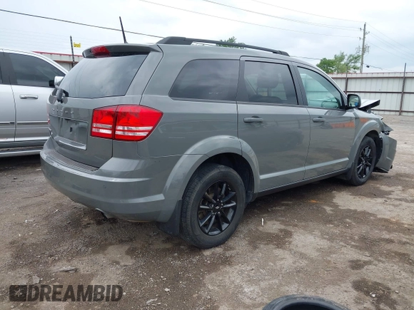 2020 Dodge Journey SE Value with VIN 3C4PDCAB0LT253914, listed as a IAAI auction lot 42064609 with 65,667 mi miles and . Bid and sale history available at carsss.com. Image 4.