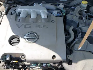 2002 Nissan Maxima GLE z VIN JN1DA31AX2T325038, wystawiony jako IAAI lot #42250279 z przebiegiem 169 555 mil mil oraz . Historia ofert i sprzedaży dostępna na DreamBid. Obrazek 10.