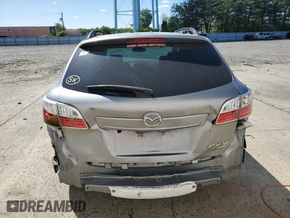 2012 Mazda CX-9 Grand Touring z VIN JM3TB3DV3C0335330, wystawiony jako Copart lot #57562015 z przebiegiem 171 397 mil mil oraz Szkoda całkowita • Salvage title. Historia ofert i sprzedaży dostępna na DreamBid. Obrazek 6.