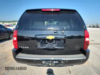 2014 Chevrolet Tahoe LTZ with VIN 1GNSKCE09ER116627, listed as a Copart auction lot 64214685 with 240,970 mi miles and Clean title. Bid and sale history available at DreamBid. Image 6.