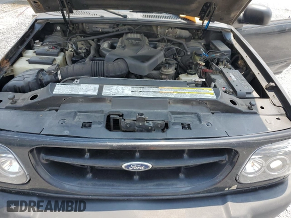 2000 Ford Explorer Sport with VIN 1FMYU60E8YUB03494, listed as a Copart auction lot 59266395 with 210,925 mi miles and Salvage title. Bid and sale history available at DreamBid. Image 12.