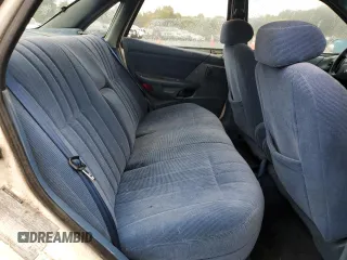 1994 Ford Taurus GL z VIN 1FALP52U5RA152732, wystawiony jako Copart lot #70472324 z przebiegiem 52 781 mil mil oraz Szkoda całkowita • Salvage title. Historia ofert i sprzedaży dostępna na DreamBid. Obrazek 10.
