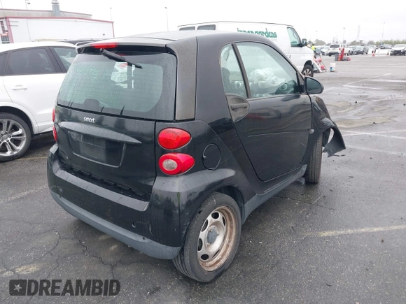 2012 Smart fortwo Pure z VIN WMEEJ3BA9CK521416, wystawiony jako IAAI lot #41847989 z przebiegiem Nie podano mil oraz . Historia ofert i sprzedaży dostępna na DreamBid. Obrazek 4.