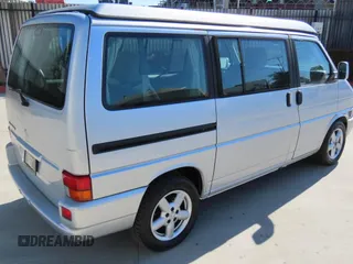 2003 Volkswagen EuroVan MV с VIN WV2NB47003H003033, выставлен на аукционе Copart как лот 59629785 с пробегом 164 173 миль миль и Чистый • Clean title. История ставок и продаж доступна на DreamBid. Изображение 3.