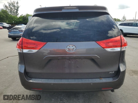 2013 Toyota Sienna XLE AAS with VIN 5TDYK3DC7DS389872, listed as a Copart auction lot 66072995 with 95,797 mi miles and Clean title. Bid and sale history available at DreamBid. Image 6.