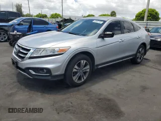 2014 Honda Crosstour EX-L z VIN 5J6TF2H57EL001119, wystawiony jako Copart lot #55932185 z przebiegiem 218 522 mil mil oraz Czysty tytuł • Clean title. Historia ofert i sprzedaży dostępna na DreamBid. Obrazek 1.