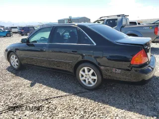 2000 Toyota Avalon XL with VIN 4T1BF28B1YU051192, listed as a Copart auction lot 57316755 with 275,671 mi miles and Salvage title. Bid and sale history available at DreamBid. Image 2.