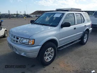 2002 Isuzu Rodeo S with VIN 4S2CK58W024342335, listed as a IAAI auction lot 42595434 with 144,529 mi miles and . Bid and sale history available at DreamBid. Image 2.