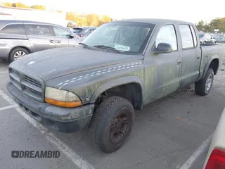 2000 Dodge Dakota Sport with VIN 1B7GG2AN7YS624989, listed as a IAAI auction lot 40820872 with Not Provided miles and . Bid and sale history available at carsss.com. Image 2.
