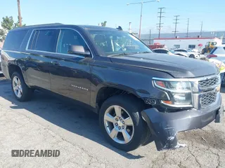 2017 Chevrolet Suburban LS with VIN 1GNSCGKC4HR124822, listed as a IAAI auction lot 42283509 with 100,371 mi miles and . Bid and sale history available at DreamBid. Image 1.