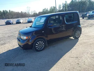2011 Nissan Cube S z VIN JN8AZ2KR8BT202933, wystawiony jako IAAI lot #41701542 z przebiegiem 162 626 mil mil oraz . Historia ofert i sprzedaży dostępna na DreamBid. Obrazek 2.