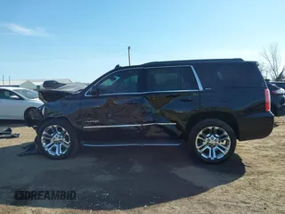 2016 GMC Yukon SLT with VIN 1GKS2BKC5GR253038, listed as a IAAI auction lot 41790030 with 101,039 mi miles. Bid and sale history available at carsss.com. Image 14.