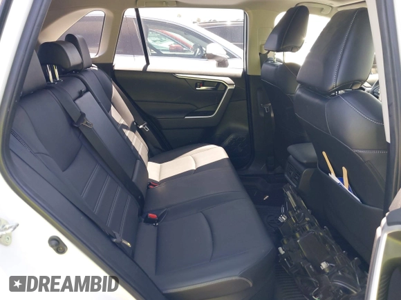 2023 Toyota RAV4 Hybrid XLE Premium with VIN JTMB6RFV0PD087237, listed as a IAAI auction lot 42606802 with 16,872 mi miles and . Bid and sale history available at DreamBid. Image 8.