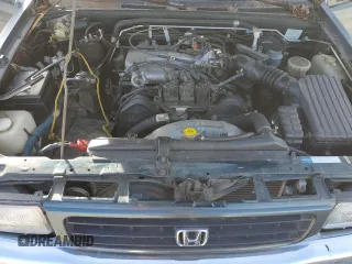 1995 Honda Passport z VIN 4S6CM58V5S4429972, wystawiony jako Copart lot #84513174 z przebiegiem 129 872 mil mil oraz Szkody całkowita. Historia ofert i sprzedaży dostępna na DreamBid. Obrazek 12.