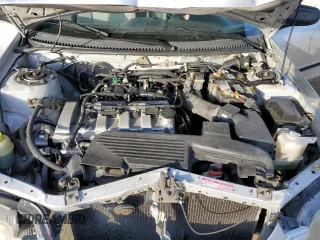 2002 Mazda Protege DX with VIN JM1BJ225120605237, listed as a Copart auction lot 49331225 with 184,556 mi miles and Salvage Title. Bid and sale history available at DreamBid. Image 12.