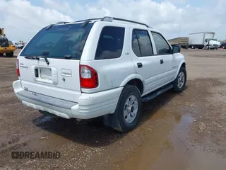 2001 Isuzu Rodeo S z VIN 4S2CK58W414357404, wystawiony jako IAAI lot #42479053 z przebiegiem Nie podano mil oraz . Historia ofert i sprzedaży dostępna na DreamBid. Obrazek 4.