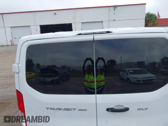 2023 Ford Transit Passenger XL with VIN 1FBAX2YG0PKA93666, listed as a IAAI auction lot 41493225 with 44,092 mi miles and . Bid and sale history available at DreamBid. Image 6.