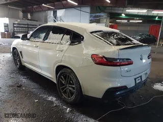 2019 BMW X4 xDrive30i with VIN 5UXUJ3C56KLG56553, listed as a IAAI auction lot 41365333 with 77,727 mi miles. Bid and sale history available at carsss.com. Image 3.