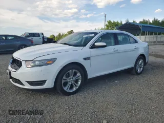 2013 Ford Taurus SEL z VIN 1FAHP2E86DG199003, wystawiony jako Copart lot #54309275 z przebiegiem 143 499 mil mil oraz Czysty tytuł • Clean title. Historia ofert i sprzedaży dostępna na DreamBid. Obrazek 1.