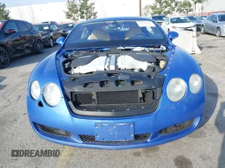 2004 Bentley Continental GT GT z VIN SCBCR63W74C022462, wystawiony jako IAAI lot #41586694 z przebiegiem 36 966 mil mil oraz . Historia ofert i sprzedaży dostępna na DreamBid. Obrazek 6.