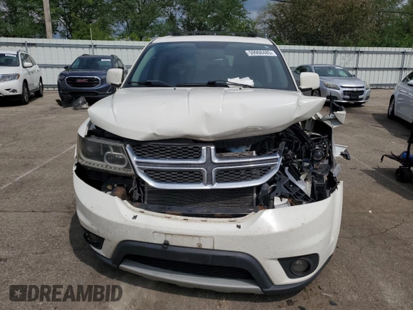 2012 Dodge Journey SXT with VIN 3C4PDCCG4CT243492, listed as a Copart auction lot 59908485 with 319,175 mi miles and Salvage title. Bid and sale history available at DreamBid. Image 5.