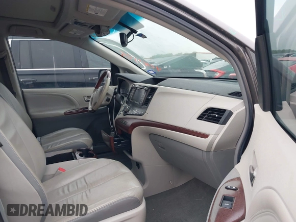2011 Toyota Sienna XLE AAS with VIN 5TDYK3DC9BS158209, listed as a IAAI auction lot 42163526 with 107,385 mi miles and . Bid and sale history available at DreamBid. Image 5.