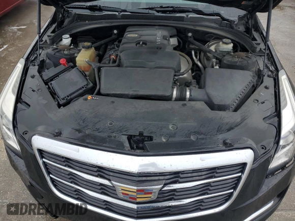2015 Cadillac ATS Standard RWD z VIN 1G6AA5RA9F0143521, wystawiony jako Copart lot #82045854 z przebiegiem 106 089 mil mil oraz Szkoda całkowita • Salvage title. Historia ofert i sprzedaży dostępna na DreamBid. Obrazek 11.