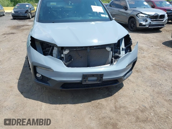 2022 Honda Pilot Special Edition with VIN 5FNYF6H27NB104990, listed as a IAAI auction lot 42219770 with 23,200 mi miles and . Bid and sale history available at DreamBid. Image 17.