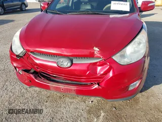 2013 Hyundai Tucson GLS with VIN KM8JU3AC6DU763590, listed as a IAAI auction lot 41999555 with 149,960 mi miles. Bid and sale history available at carsss.com. Image 6.